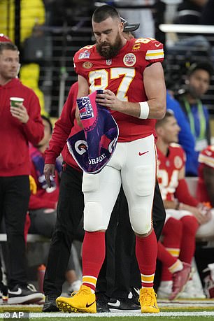 Kelce was pulled away from Coach Reid by a teammate