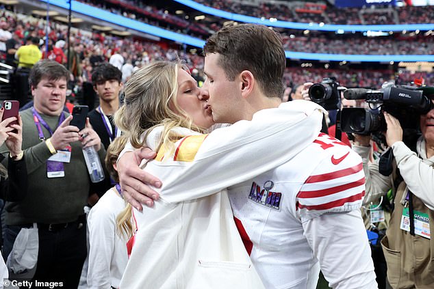 Purdy, who believes life is much more fulfilling when you serve others, and his longtime fiancée Jenna Brandt before kickoff on Sunday