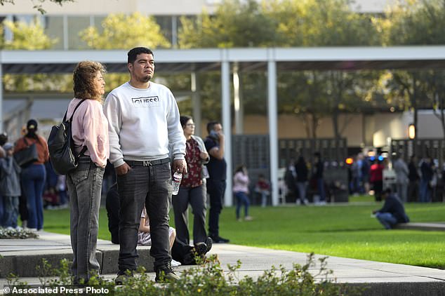 Officials announced that a reunification center had been set up at a nearby gym where people could find their loved ones