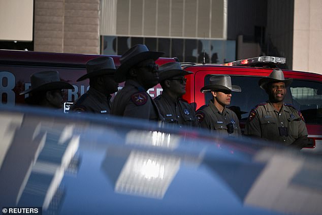 At least twenty police and fire trucks were near one of the church entrances on Sunday afternoon, including the fire brigade's hazardous materials truck