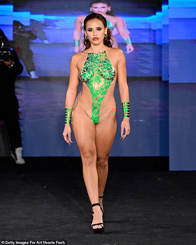 A neon green look that incorporates small pieces of tape to create a monokini effect