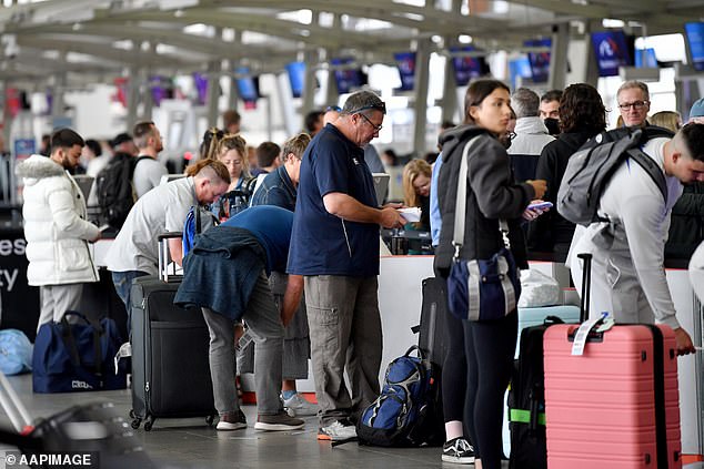 The widespread chaos was caused by only two employees calling in sick.  The photo shows Sydney Airport