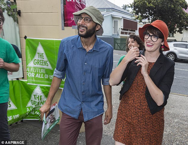 The Queensland Premier has wished Greens MP Amy MacMahon (pictured with a supporter) a speedy recovery