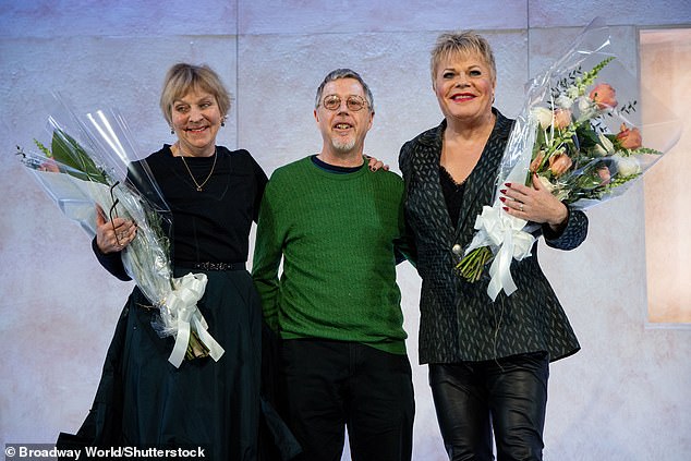 Actress Selina Caddell (left), writer Mark Izzard (center) and actor Suzy Eddie Izzard (right) respectively accepted bouquets of flowers after taking a bow at the Greenwich House Theater