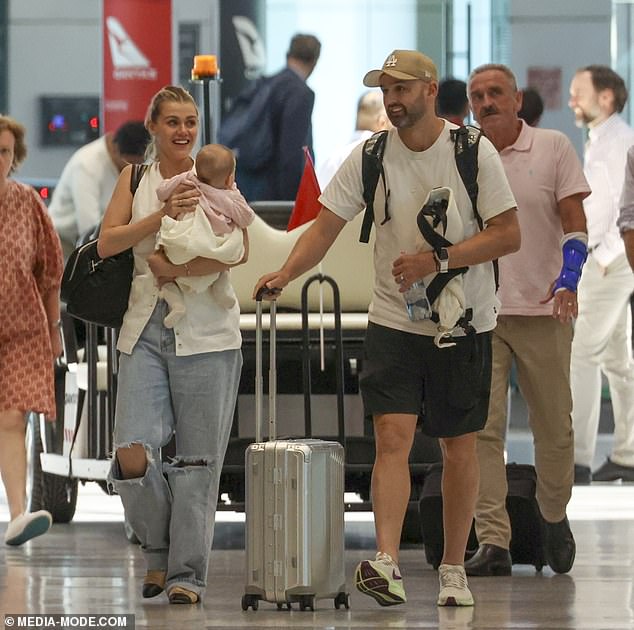 The couple beamed with joy as they arrived home with their newborn son, after keeping the pregnancy a secret and avoiding a birth announcement