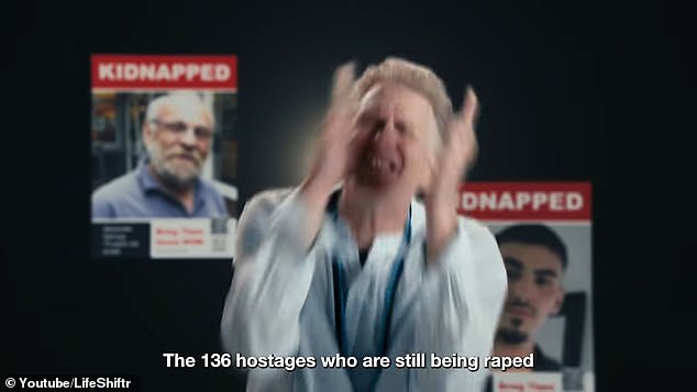 Rapaport becomes emotional as he speaks of the hostages being held in captivity, as posters of the abductees hang in the background