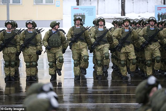 A Russian-Canadian citizen has admitted he plotted to violate US sanctions by exporting $7 million worth of weapons to the Russian military.  (Image: Russian paratroopers march during the military parade at the 76th Guards Air Assault Division in Pskov, Russia, March 1, 2020)