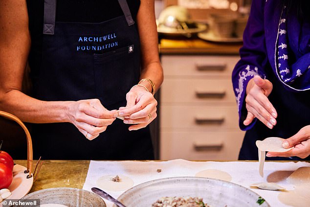 The women showed Megan how to fill and fold the dumplings properly so they keep their shape while cooking (photo above)