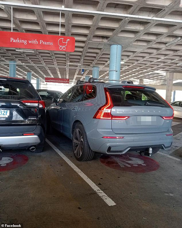 A man found an angry note on his car because he parked in a spot reserved for parents, similar to the one in the photo - but he is a parent and his wife had already taken their child to the store