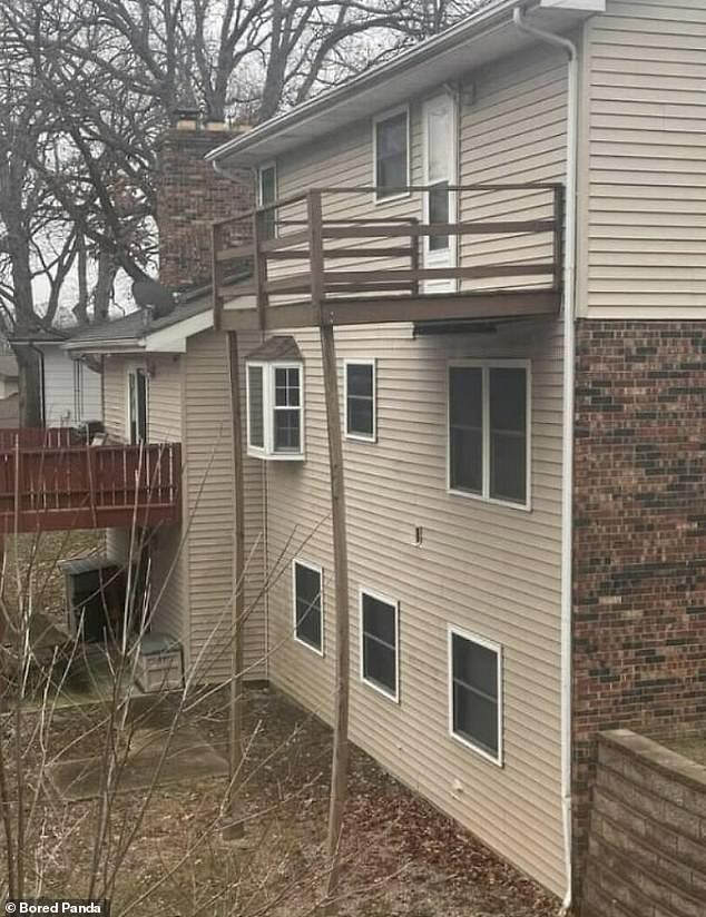 It looks like someone wanted to create a balcony to enjoy the view, but it doesn't look like it could support the weight of a person