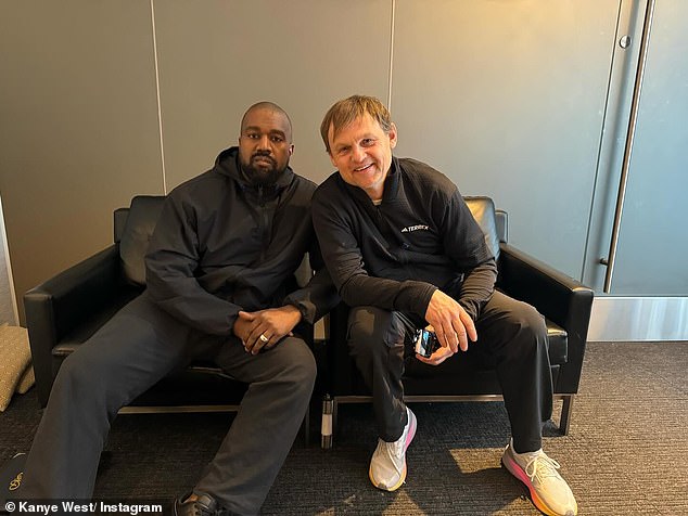 The 46-year-old rapper lost his billionaire status in 2022 when a number of brands terminated his lucrative contracts due to his anti-Semitic outbursts (pictured with Adidas CEO Bjørn Gulden)