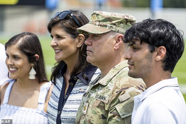 While Major Michael Haley is deployed, the couple's children, Rena (left) and Nalin (right), have gone on campaign with their mother