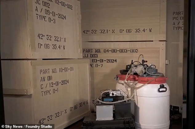 In the lock-up, two white barrels are depicted next to crates that would contain the works of art