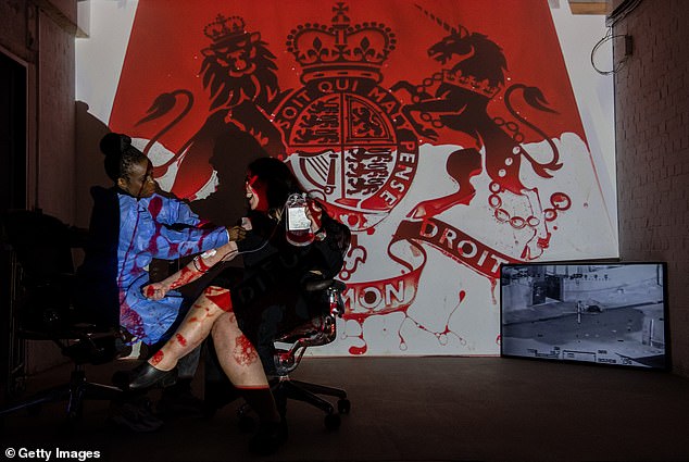 Afghan and Iraqi people donated blood for a work of art by Molodkin entitled Royal Blood.  The image was projected onto St Paul's Cathedral in protest against Prince Harry's role in the Afghan war