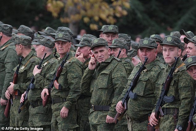 Older reservists called up during the partial mobilization are seen in 2022 at a departure ceremony in Sevastopol, Crimea, before going to the front line (archive photo)