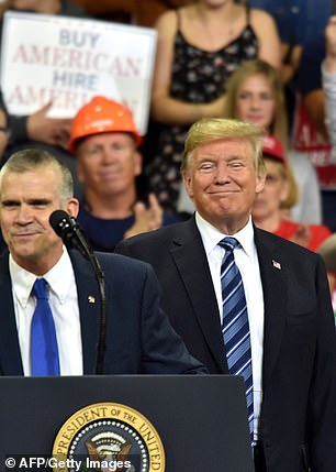 Trump stood behind Rosendale at a rally in Montana in September 2018. The then-president endorsed the then-state auditor in his previous failed Senate bid against Tester