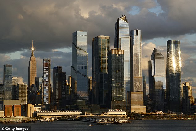 The sun sets on Hudson Yards and the Empire State Building in New York City in October.  Manhattan had no groundbreaking office buildings last year