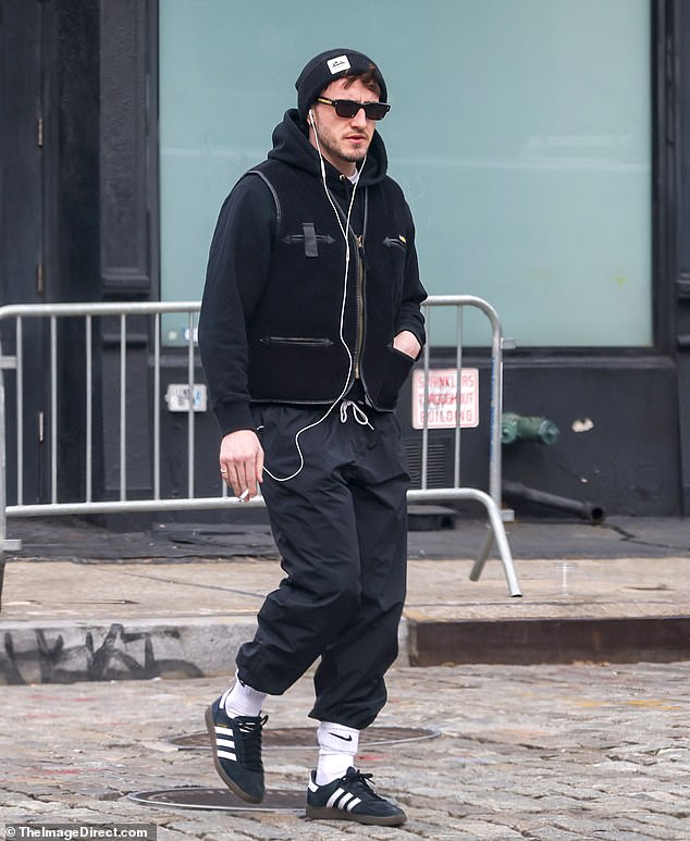 He stepped out alone for a morning walk in the big apple, listening to music through his wired headphones