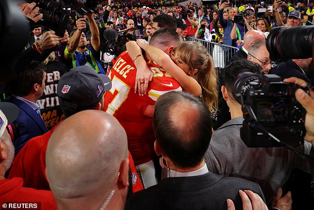 Cameras flew around the couple as they shared an emotional embrace on the court in Las Vegas