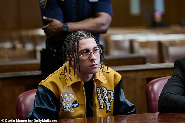 He wore a yellow bomber jacket with glasses and his hair in braids during his final appearance at the courthouse