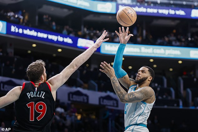 Bridges can be seen shooting above Toronto Raptors center Jakob Poeltl during a game last week