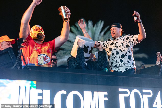 After the Chiefs, Jason (left) joined the party by wearing a Lucha Libre wrestling mask