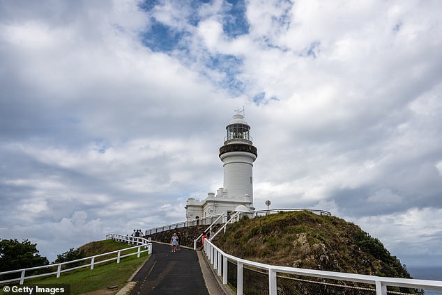 Shocking footage showed several vehicles left on the road in front of the public car park by tourists desperate to catch the sunrise at the famous Cape Byron Lighthouse (pictured)