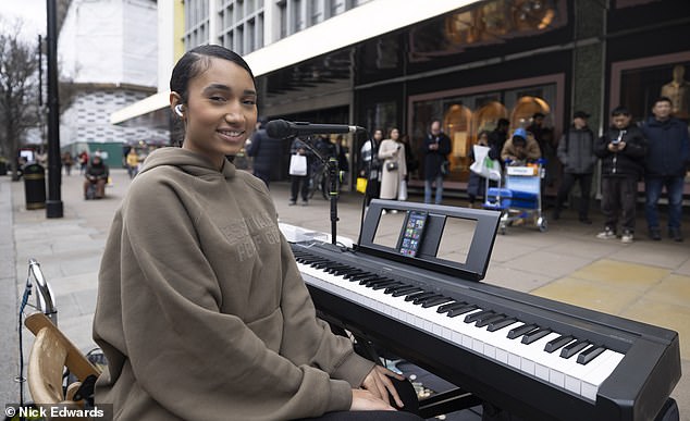 Harmonie London, 20, (pictured) was singing outside the John Lewis flagship store in London on Sunday when she was approached by volunteer police officer Maya Hadzhipetkova