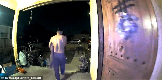 The man can be seen walking away from the home in Los Angeles.  His DNA was linked to the LA home invasion and Morin's body