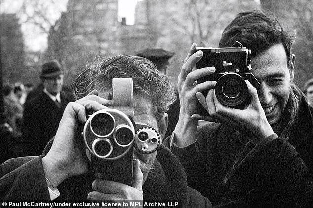 Photographers in Central Park.  New York, February 1964. Pigmented inkjet print.  © 1964 Paul McCartney under exclusive license from MPL Archive LLP