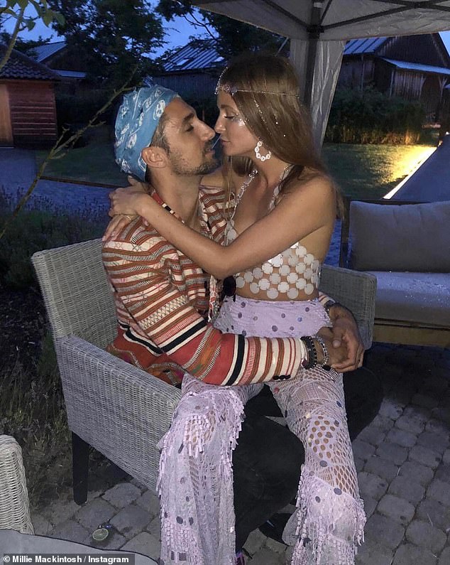 The reality star couple were also seen cozying up together at Millie's festival-themed 30th birthday party