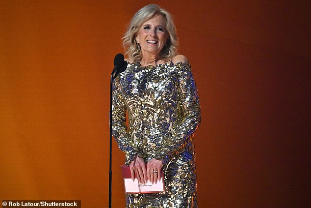 But at what point does fierce patronage turn into hard-nosed politics – and at what point is it fair to assume that Nana Jill has a taste for the San Pellegrino served at Anna Wintour's shoots?  (Image: Jill presenting an award at the 2023 Grammys).