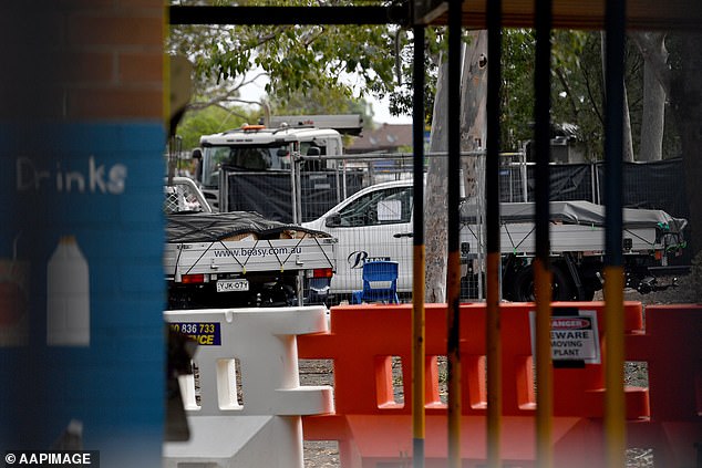 On Wednesday, workers were seen removing asbestos from Liverpool West Public School