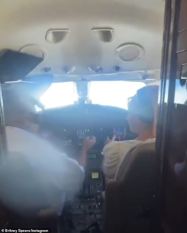 In the clip, Spears was seen wearing headphones in the co-pilot's seat, listening to instructions from the pilot