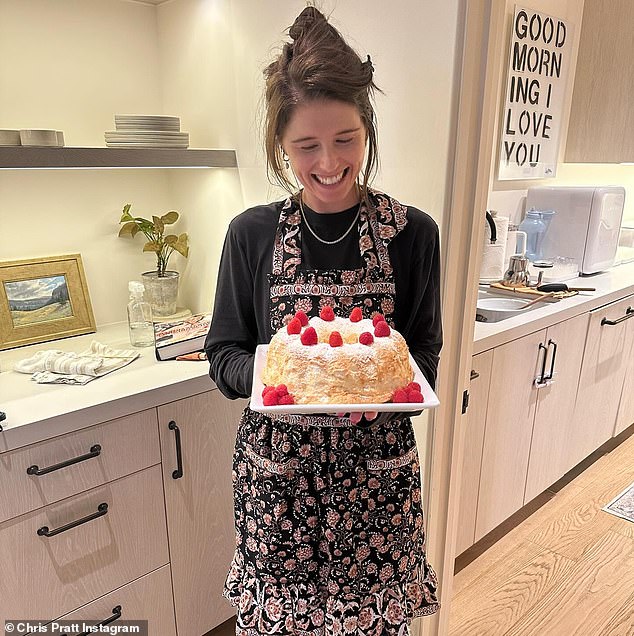 Arnold Schwarzenegger and Maria Shriver's daughter was overjoyed after baking a Valentine's Day cake with icing sugar and raspberries