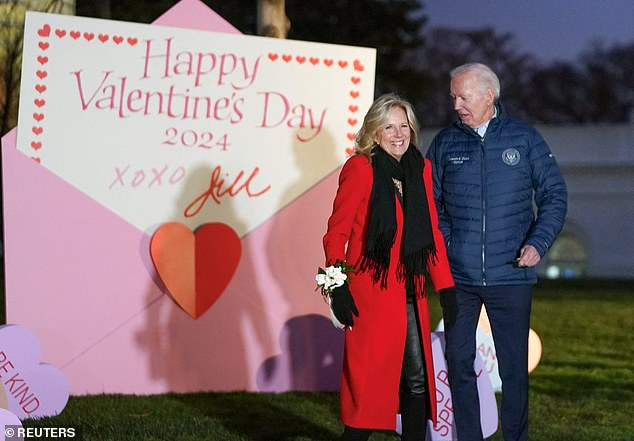 First lady Jill Biden (left) and President Joe Biden (right) took a walk to the North Lawn to view the White House Valentine's Day decorations on Wednesday evening