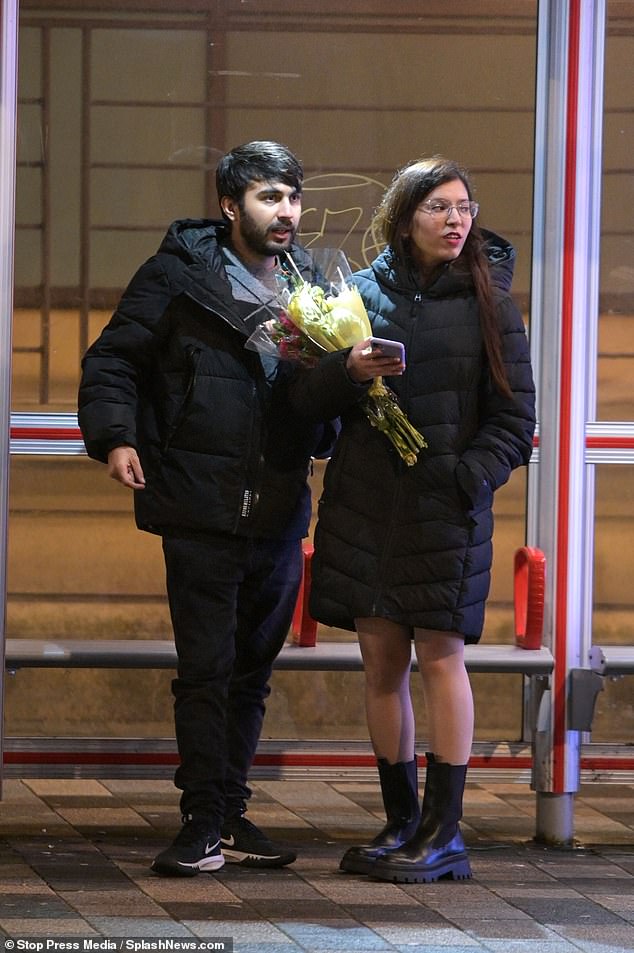 Many were in a lovelorn mood as they strolled down the sidewalk with flowers and heart-shaped balloons in hand