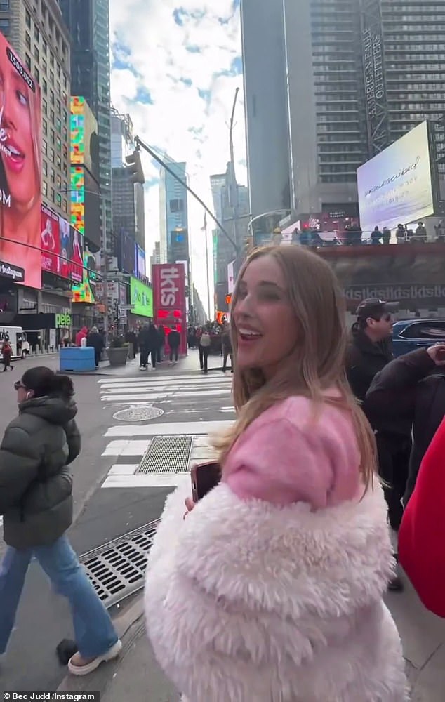 In the clip, Judd is seen walking through the iconic Times Square before admiring her advertisement on the side of a building