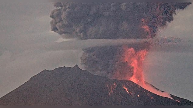 Dramatic images of the eruption show the column of debris rising into the sky as lightning forks shoot through the black cloud