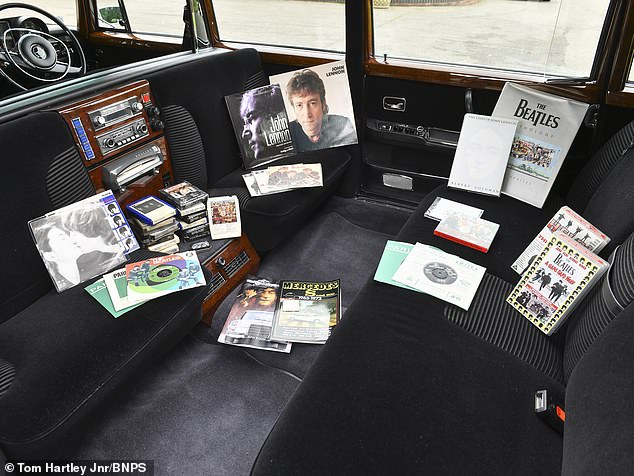 The rear cabin of the car is decorated with Mercedes' iconic polished wood and leather decor