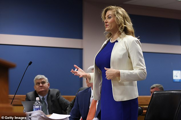 Attorney Ashleigh Merchant, who represents defendant Michael Roman, speaks to the judge during the stunning case