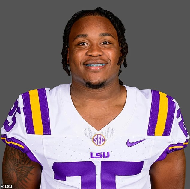 Holly, who plays running back for the Tigers, was taken into custody on three charges;  including attempted manslaughter