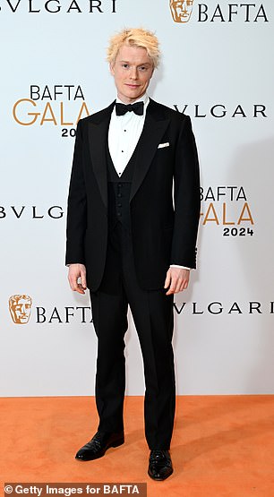 Freddie Fox wore a classic black three-piece suit