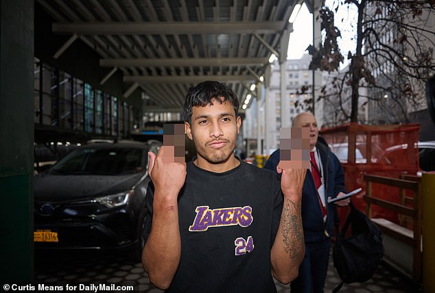 Jhoan Boada, 22, was arrested in connection with the attack and was pictured leaving the courthouse with his middle fingers up at reporters.  He was not charged Thursday