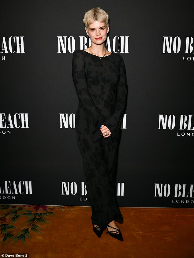 The model and daughter of Bob Geldof exuded elegance in the long-sleeved maxi dress paired with a black handbag