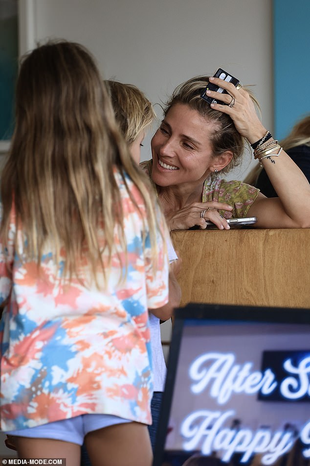 She was seen laughing with her clan at a local cafe