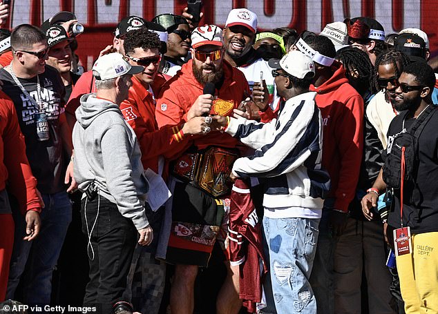 A drunken Kelce had to be held up by his Chiefs teammates during their Super Bowl parade