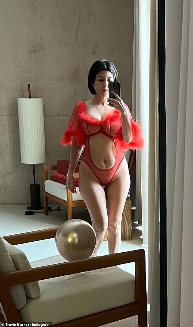 Meanwhile, Kourtney told her husband she was 'obsessed' with him after he honored her with a raunchy Valentine's Day tribute on Instagram