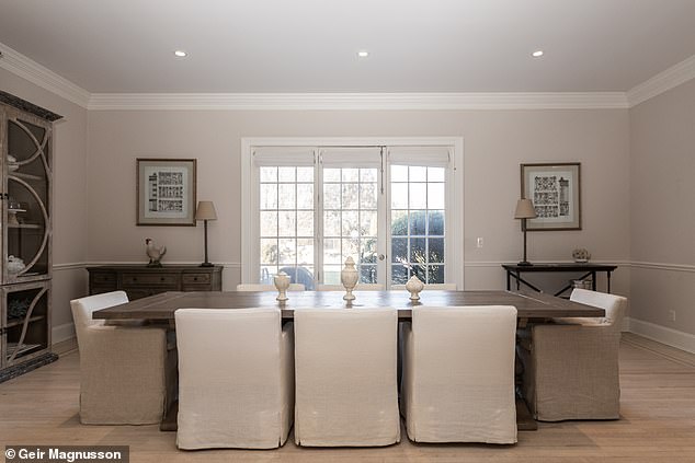 The shingle style house has direct access to Fowlers Beach, less than a mile away.  In the photo: the former dining room