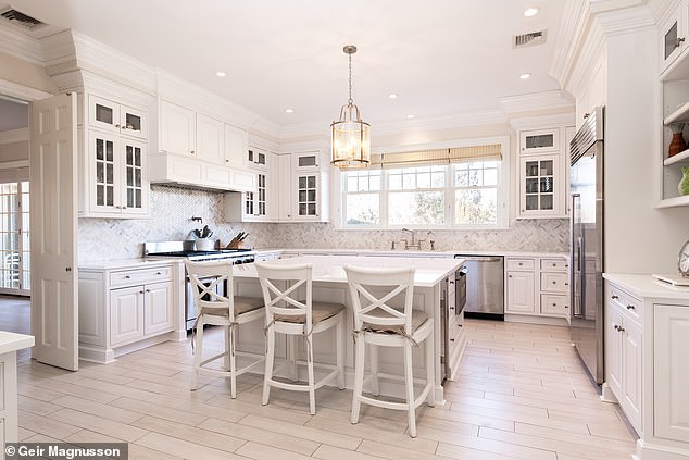 In 2018, the listing shows, the Hiltons renovated the gourmet kitchen (pictured), all bathrooms and the large master suite